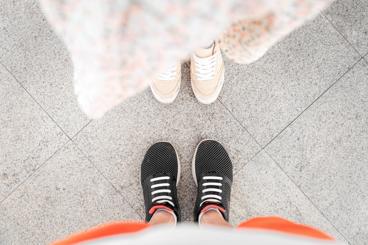 Striped socks worn with casual shoes