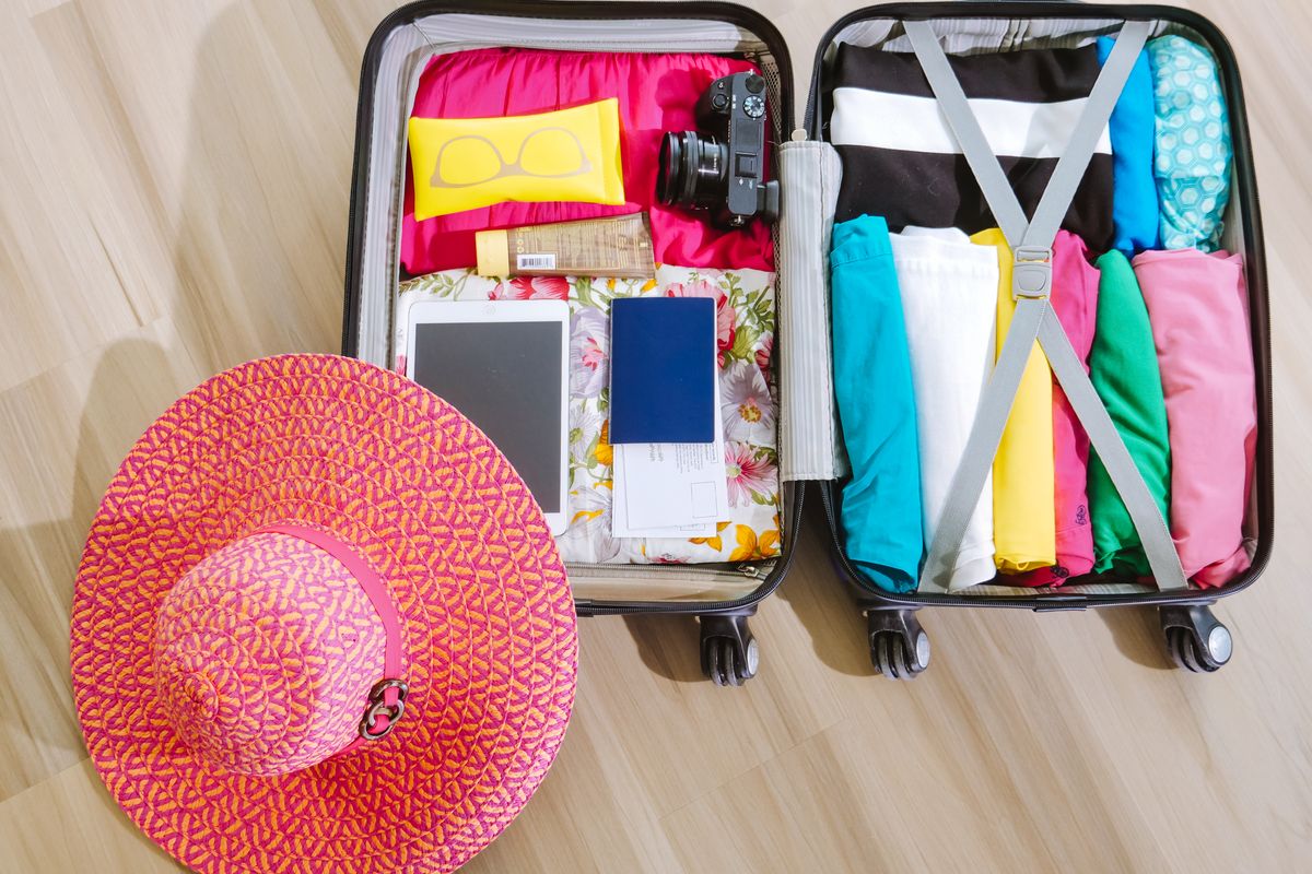 A neatly packed suitcase ready for a weekend trip